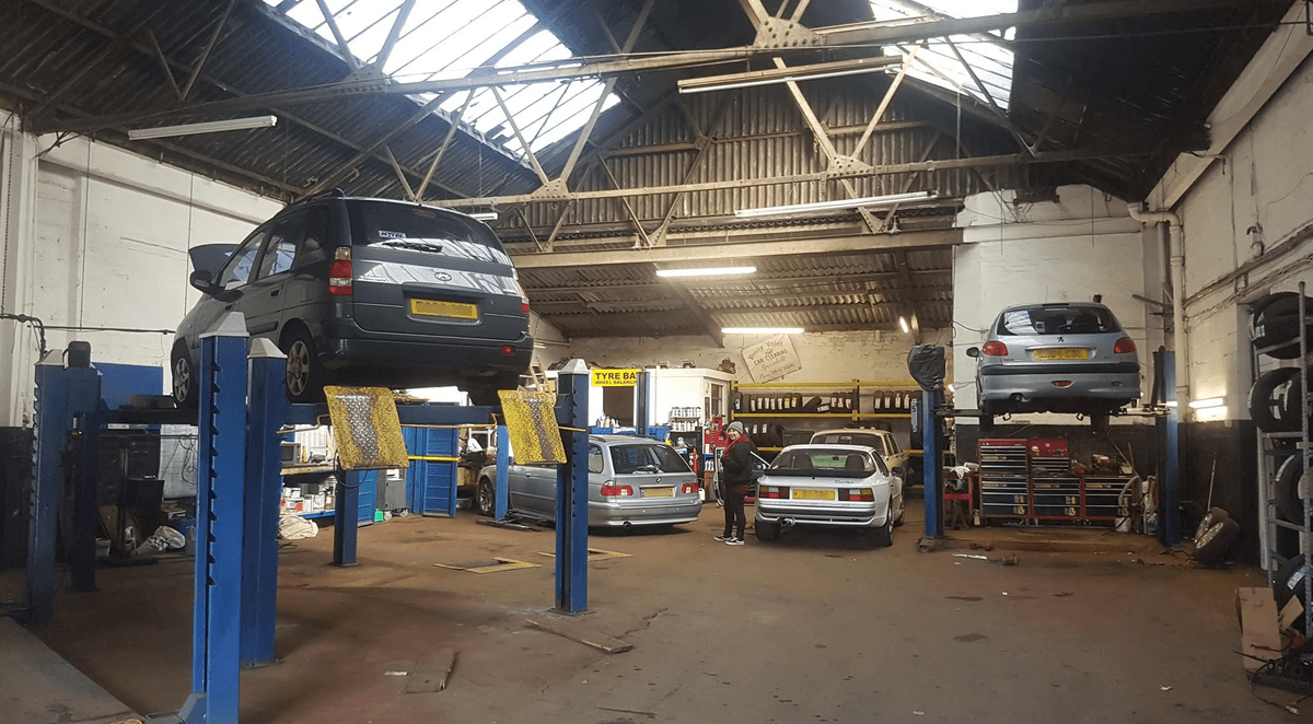 Mechanic working on a car